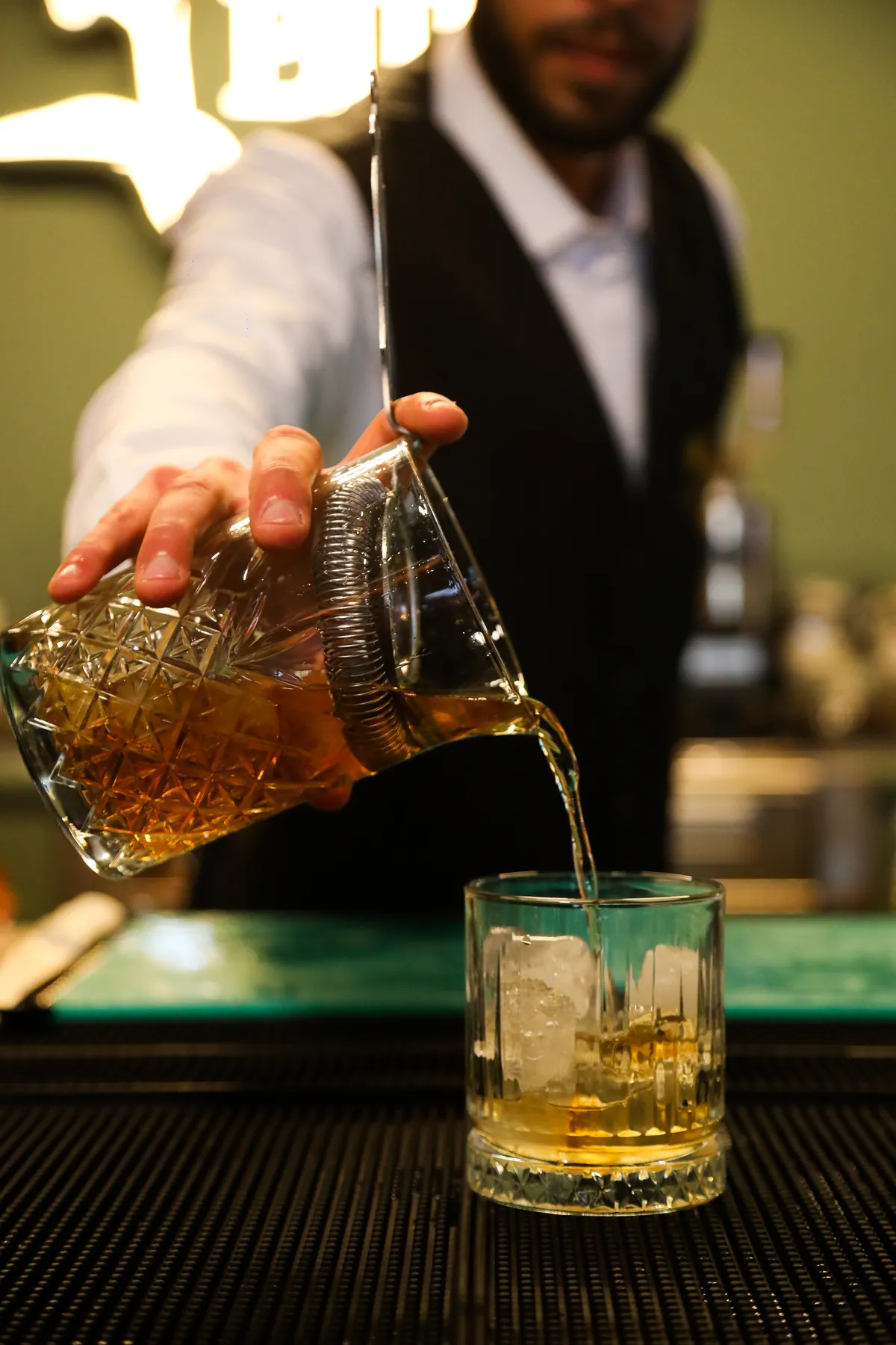 Bartender crafting cocktails
