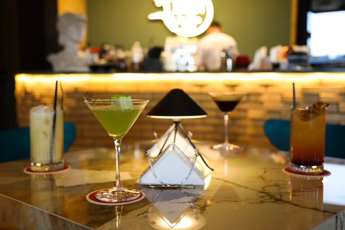 Cocktail lineup on the bar counter